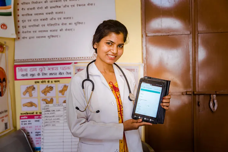Medical worker holding a tablet 