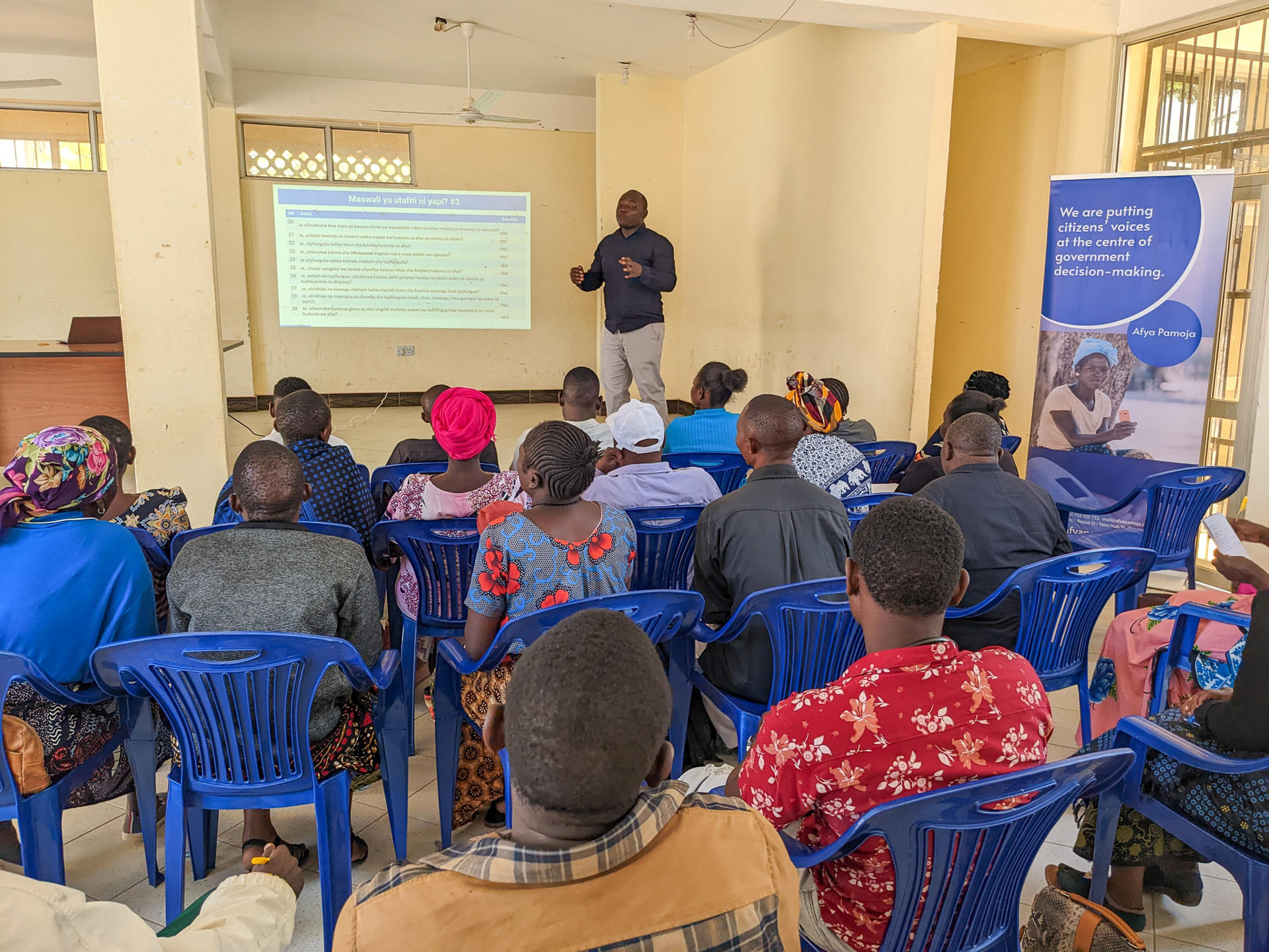 Man teaching about healthcare in Tanzania 