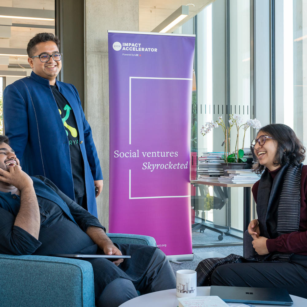 Three colleagues chatting in the office