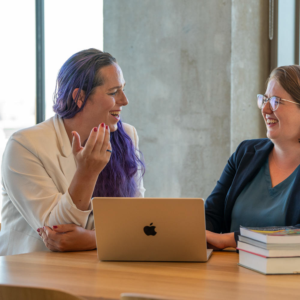 Two female founders working